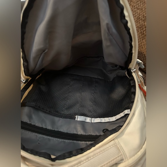 The North Face Cream Backpack with Orange Zipper Pulls - Picture 5 of 9